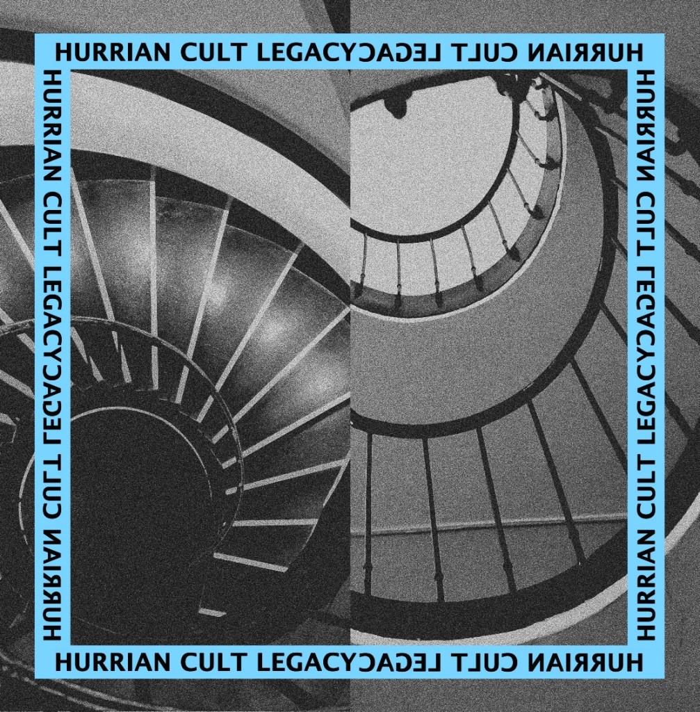 An image divided in two, one side with a black spiral staircase, the other with a grey spiral staircase, curling like snail shells with a light blue border.